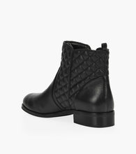 quilted tumbled leather flat bootie.  Karsyn