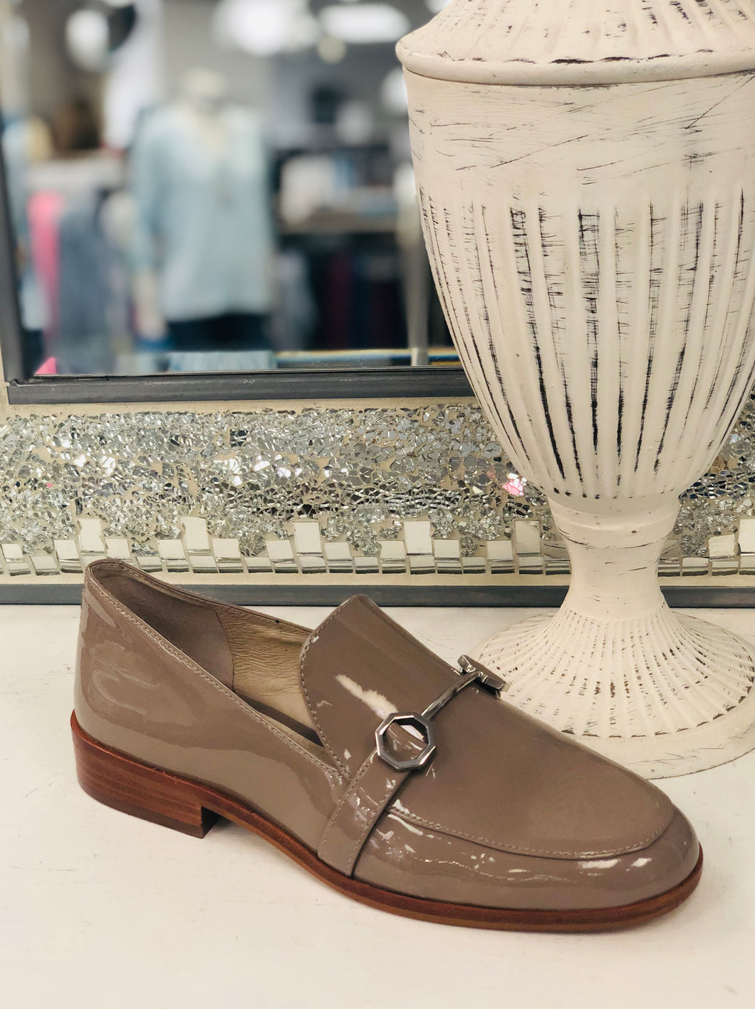Taupe patent loafer with silver equestrian embellishment